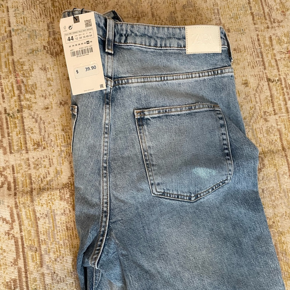 Zara High waisted distressed bell bottoms